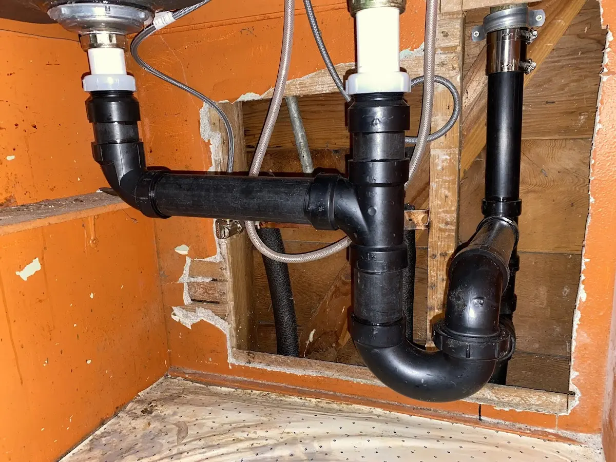 Professional Garbage Disposal Repair equipment and tools on the job in Bristol